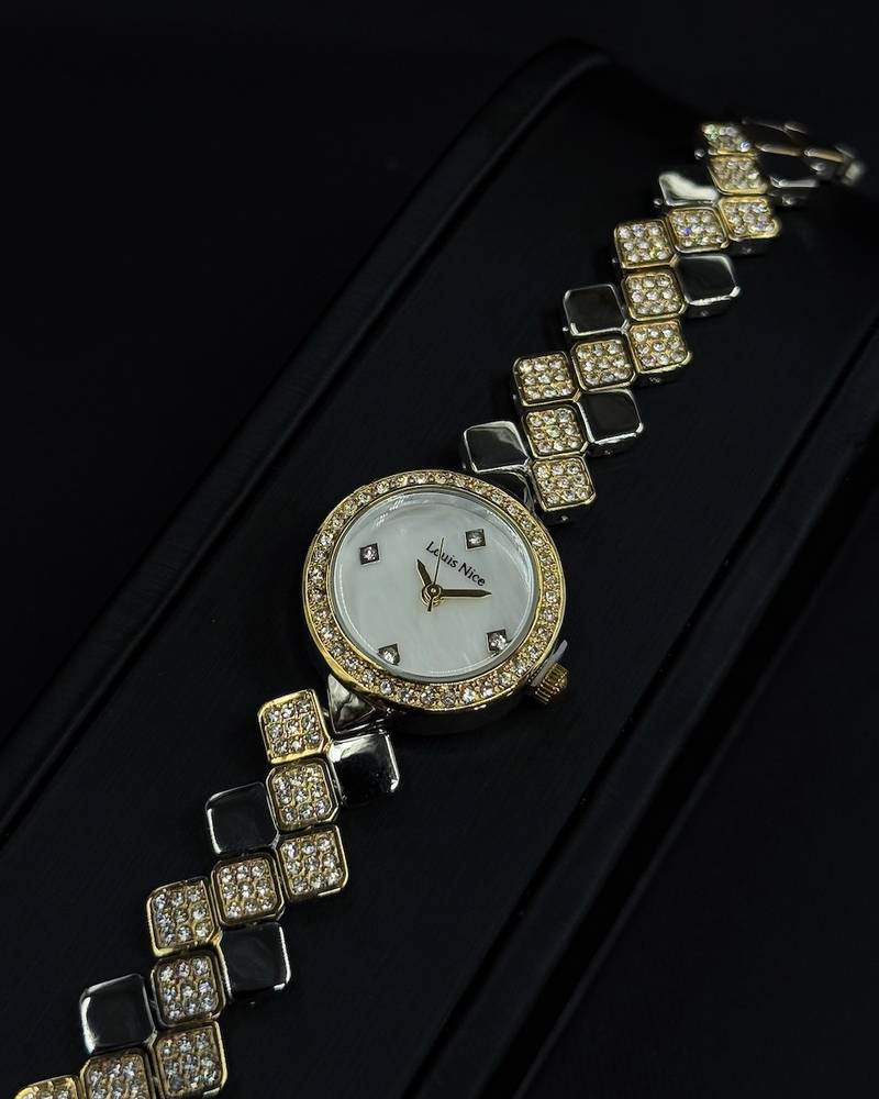 A women's watch with elegant, shimmering details.