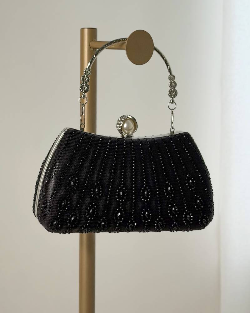 Crystal evening bag with royal pearl clasp