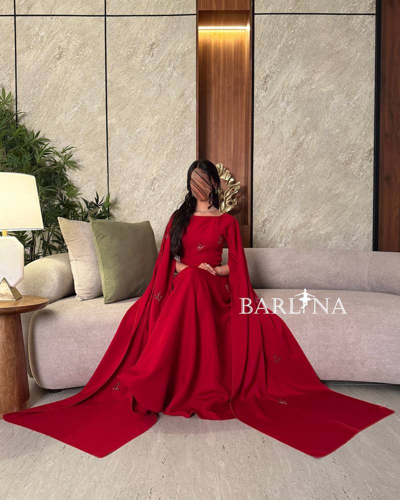 Royal red dress with long draped cape