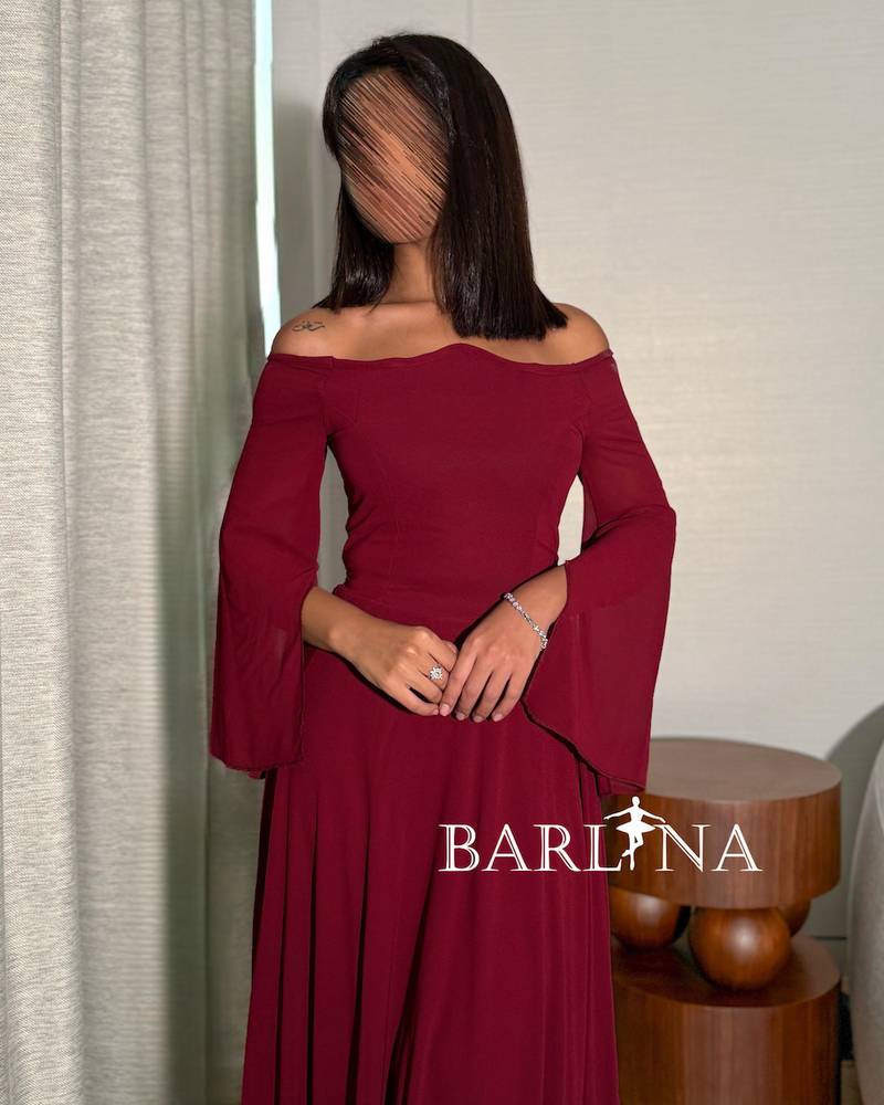 A simple burgundy dress in flowing chiffon fabric