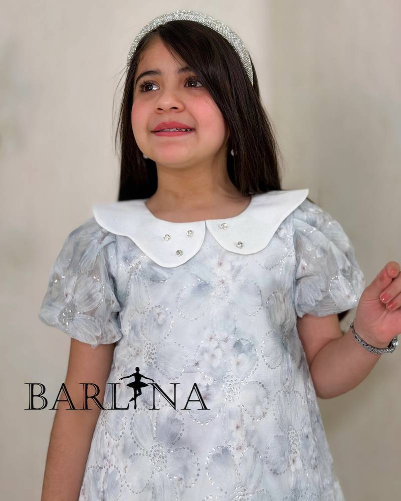 Girls' ice blue dress with light layers