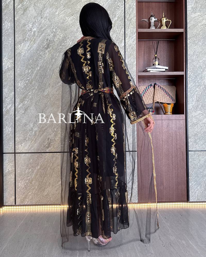 Black jalabiya with gold embroidery and transparent abaya