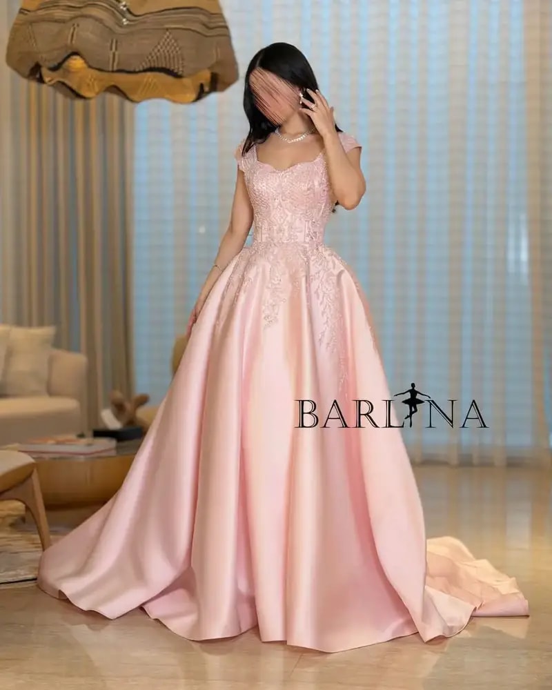 Evening dress with a full skirt and elegant embroidery