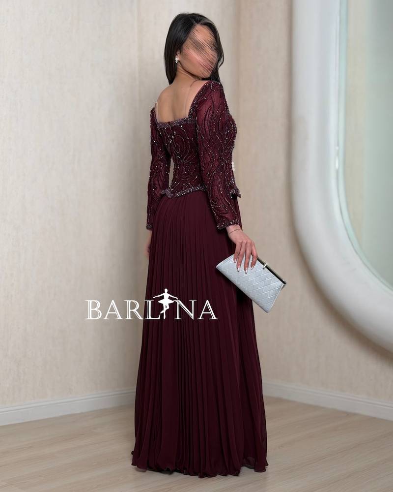 Maroon wide evening dress with luxurious embroidery