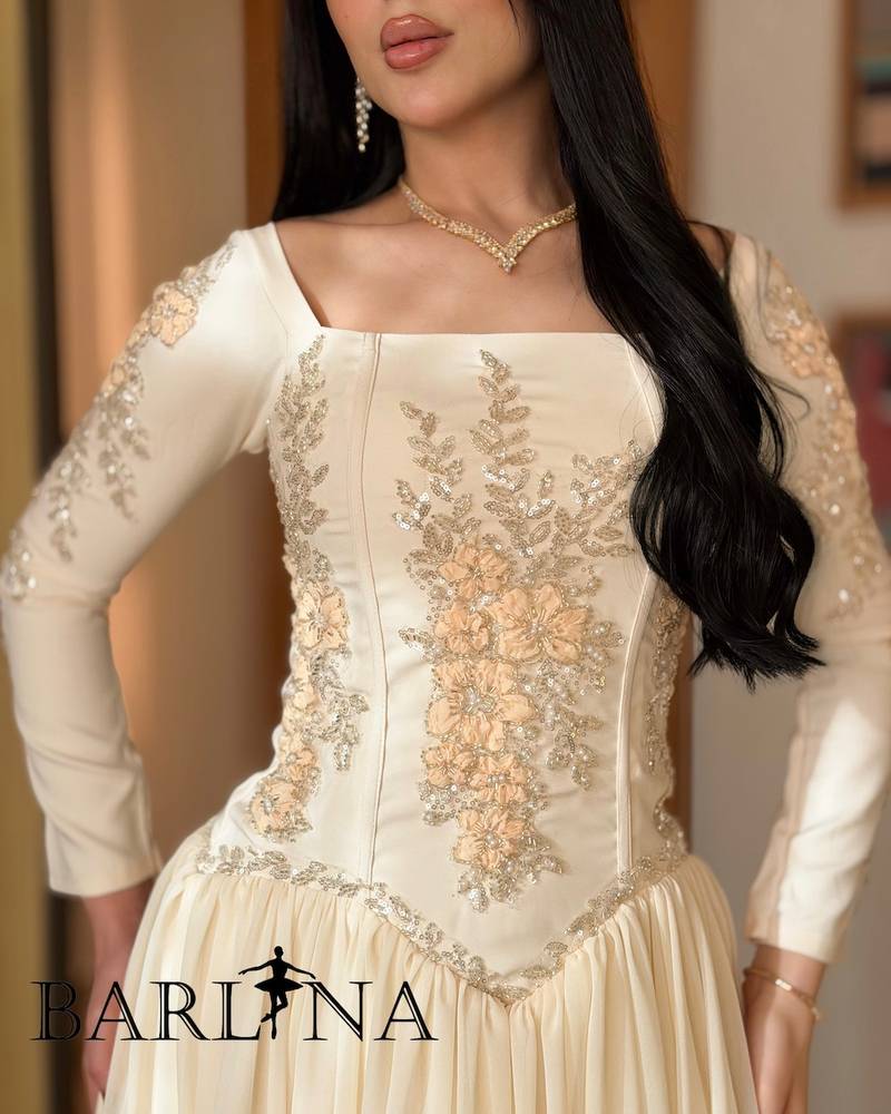 Ivory wide dress with long embroidered sleeves