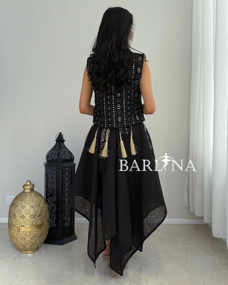Navy blue jalabiya with an embroidered vest