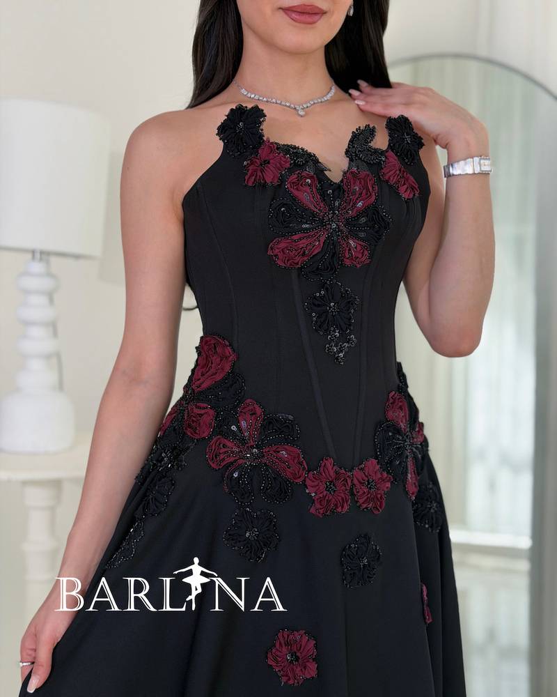 Long black evening dress with an elegant corset cut