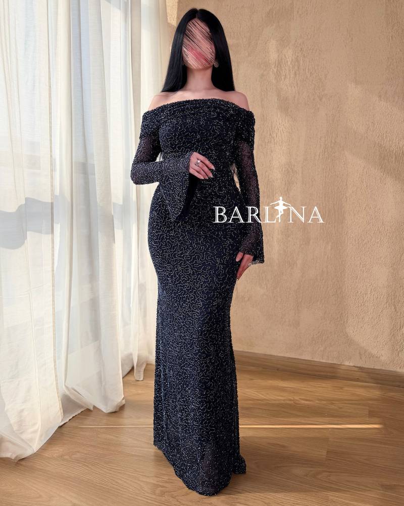 Navy blue dress embroidered with delicate shimmering details