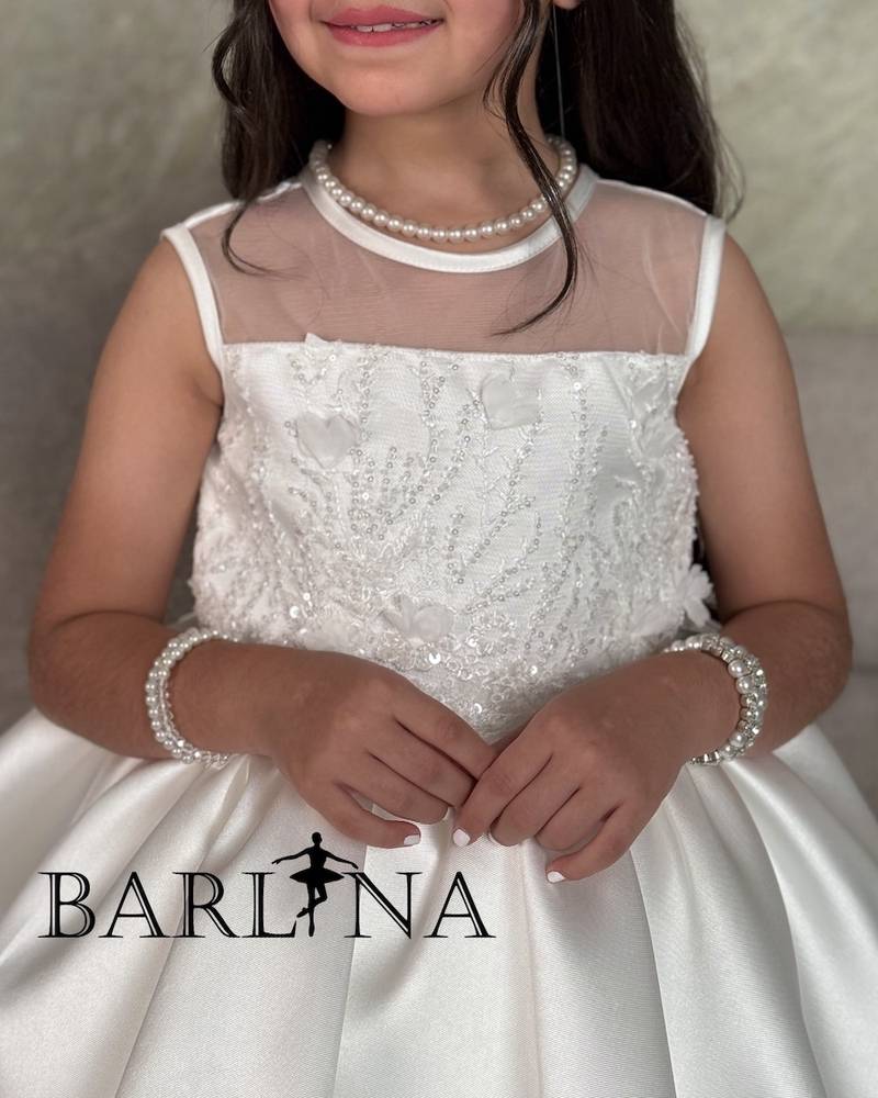 Girls' white dress with embroidery and ruffle details