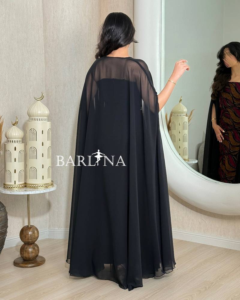 Jalabiya with artistic patterns in shades of brown and burgundy