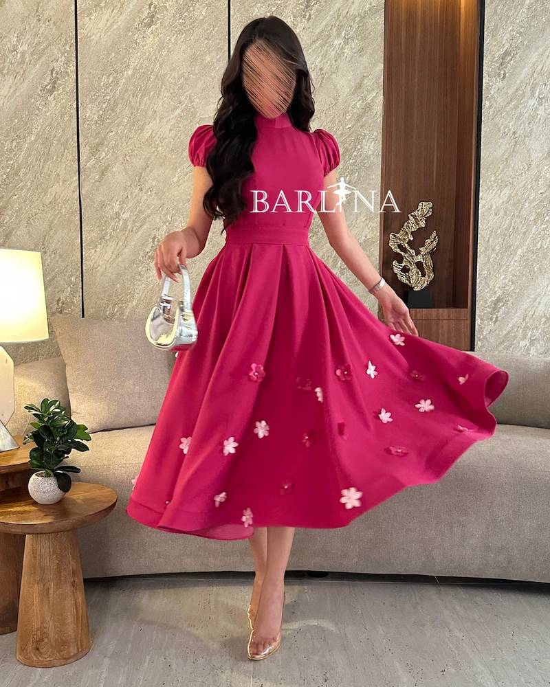 Fuchsia midi dress with short puff sleeves