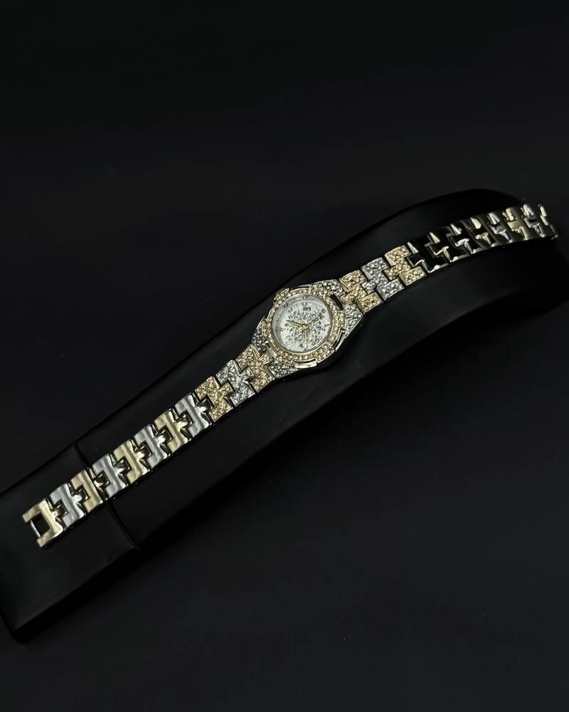 Elegant women's watch adorned with sparkling gemstones