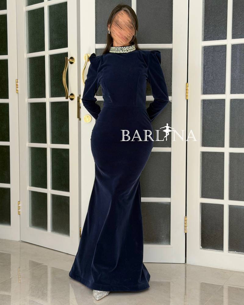 Navy velvet dress with a studded neckline