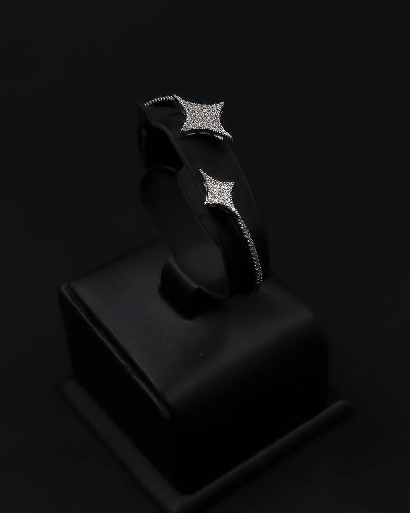 Bracelet and ring with a star design, studded with crystals