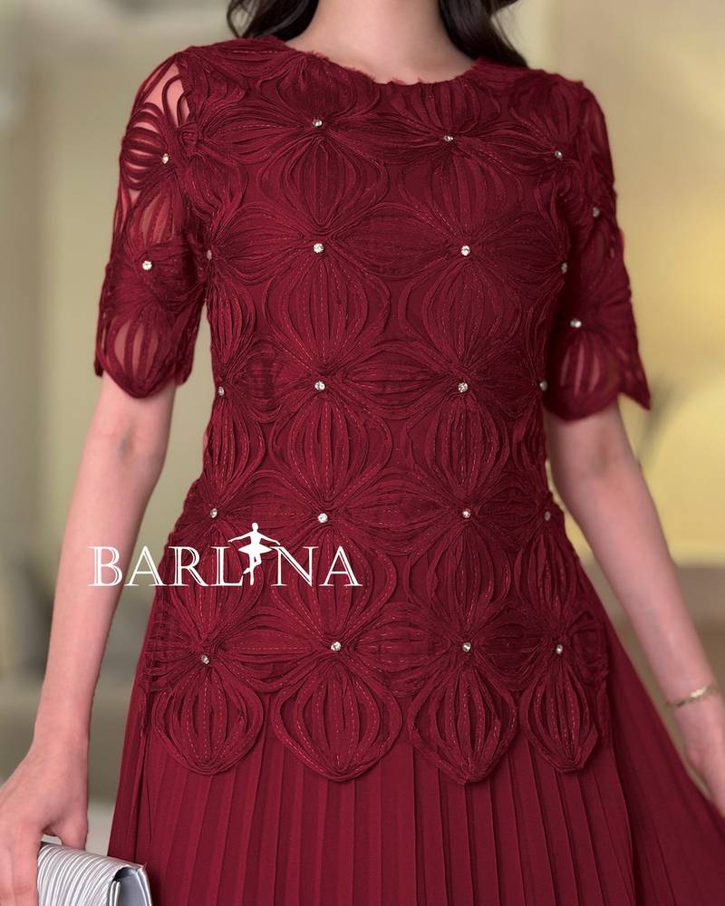 Soft pleated dress with embroidered bodice
