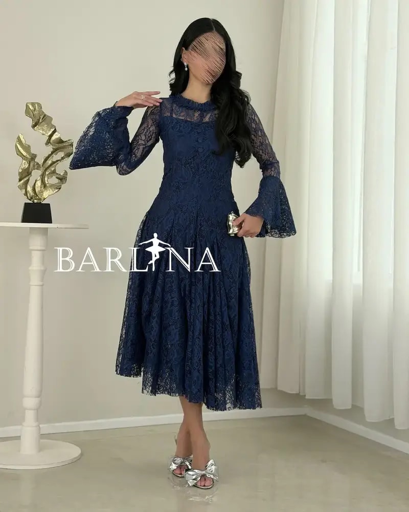 A soft dress adorned with elegant lace patterns