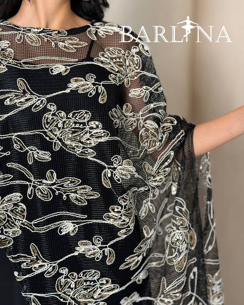 Elegant jumpsuit with a sheer embroidered panel