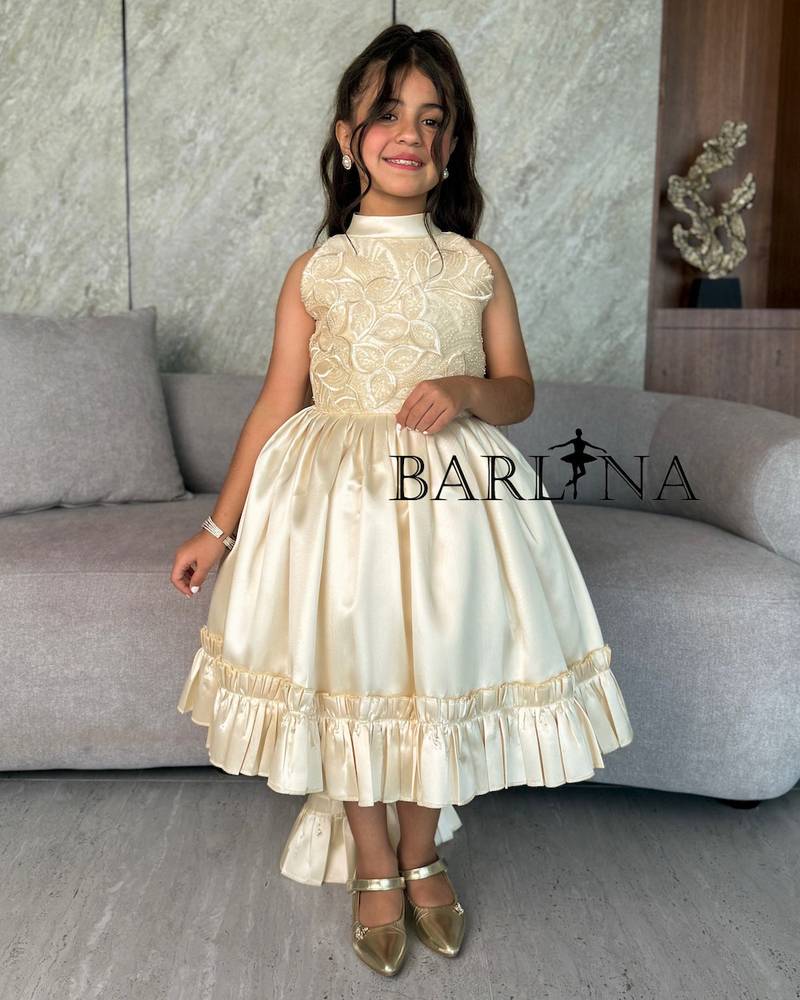 Beige girls' dress with raised embroidery