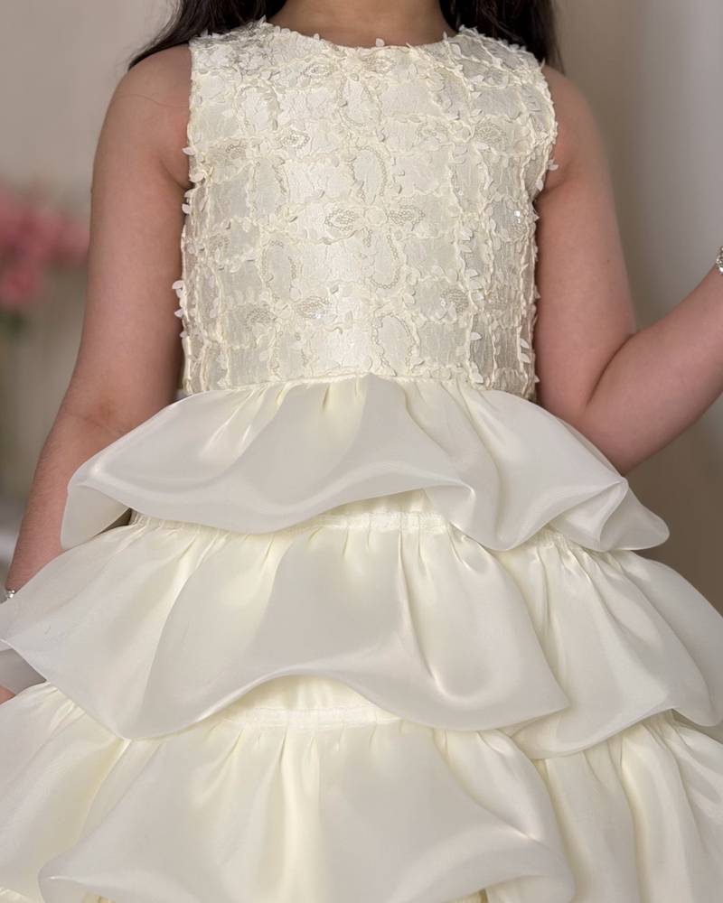 Ivory girls' dress with multiple ruffle layers