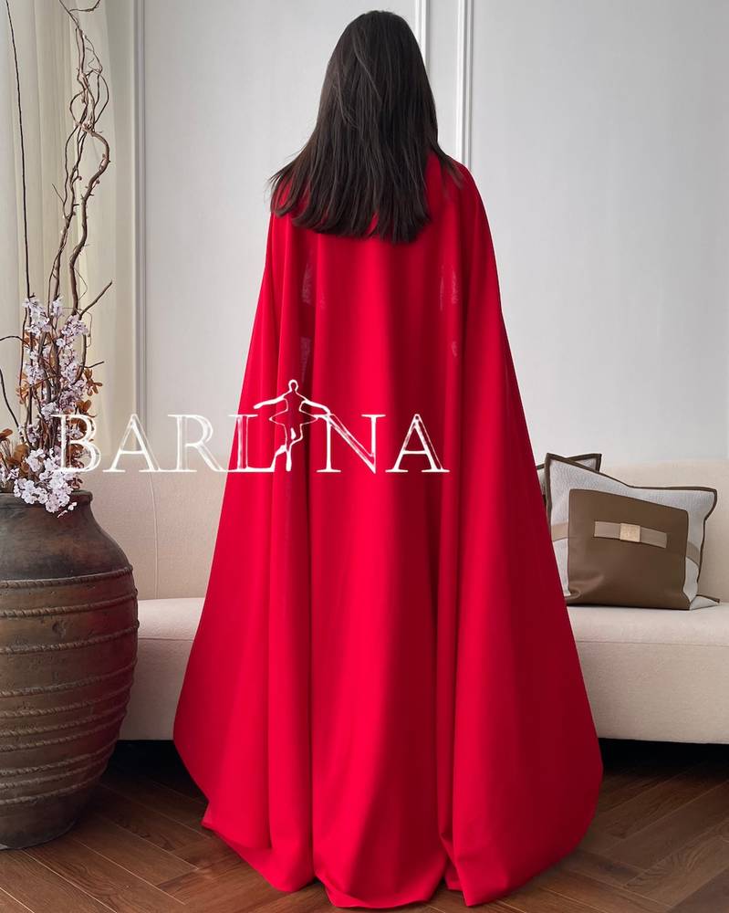 Long red evening dress with cape and crystals