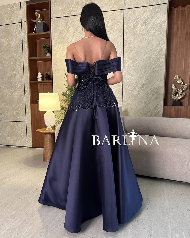Navy blue evening dress with luxurious embroidery on the chest