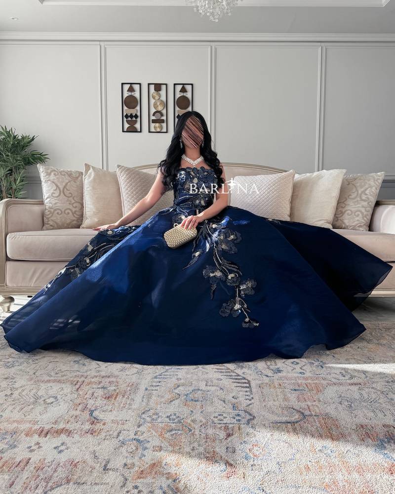 Navy blue open neck evening dress