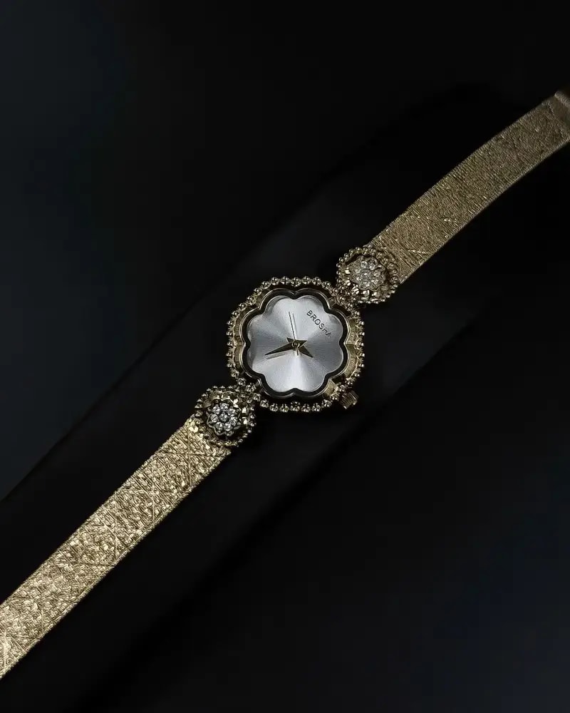 A delicate women's watch with an elegant floral design