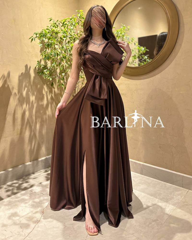 Shiny brown dress with elegant front bow