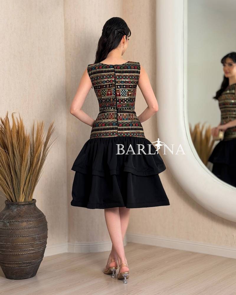 Layered dress with traditional embroidery