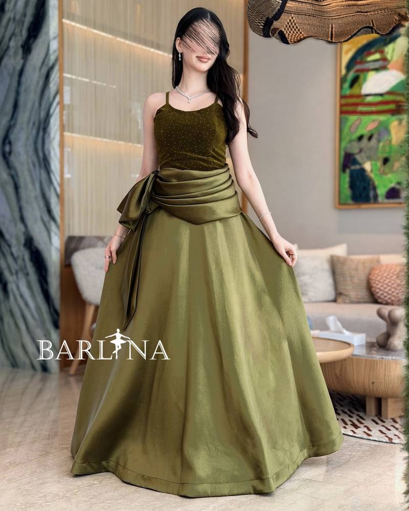 Olive green evening dress with a velvet bodice
