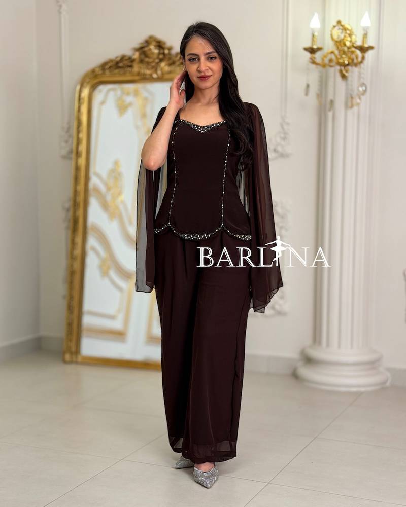 Elegant burgundy jumpsuit with delicate details