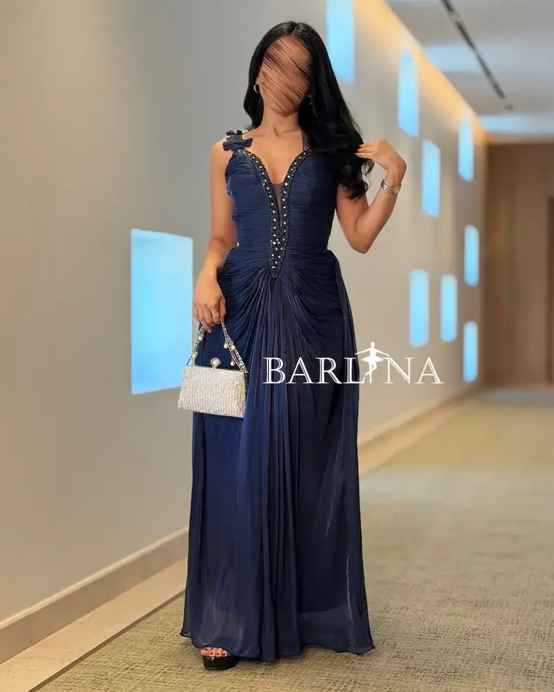 Long navy dress with embroidered details