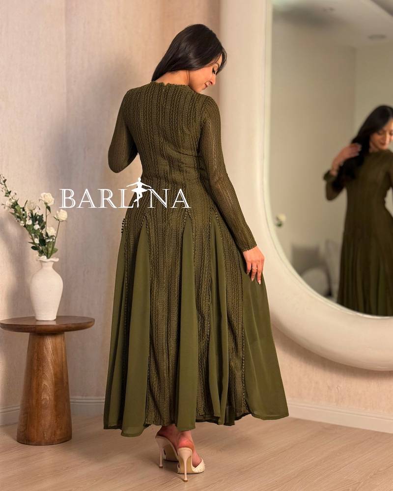 Long-sleeved dress with a wide flared cut