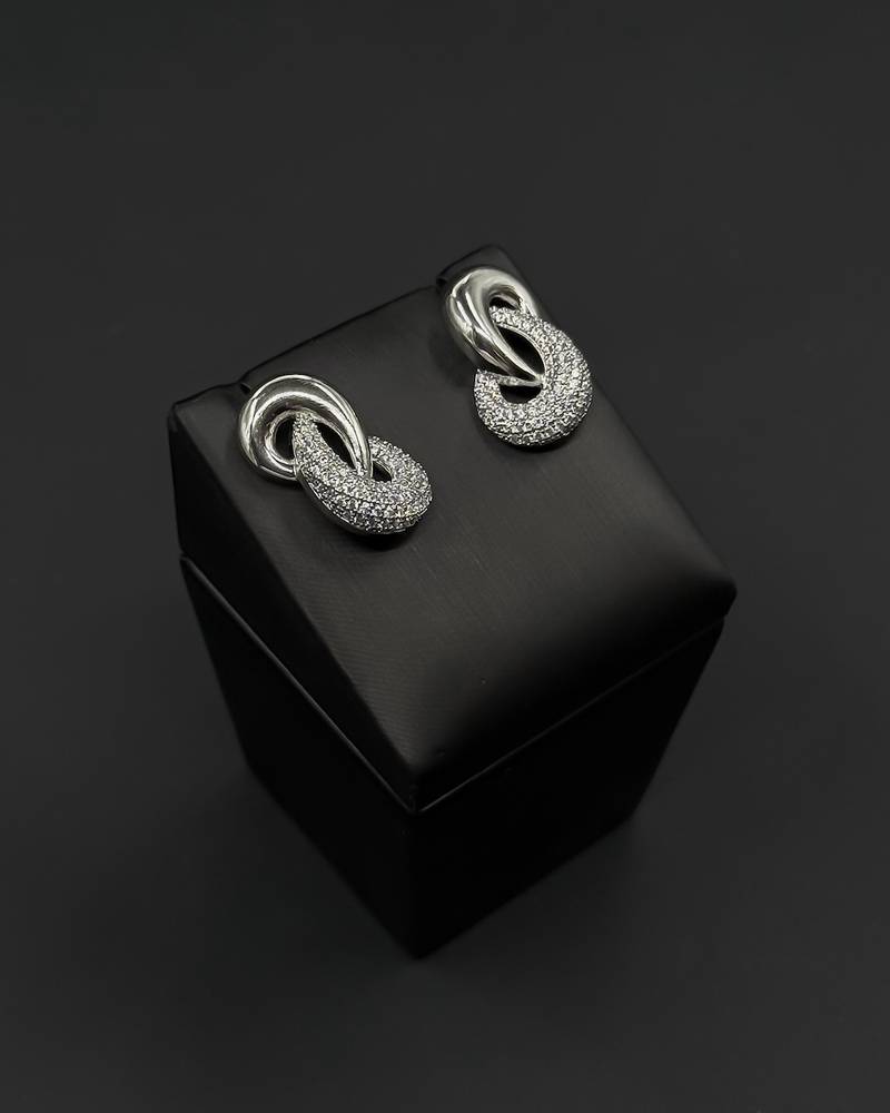 Luxurious earrings with interlocking studded hoops