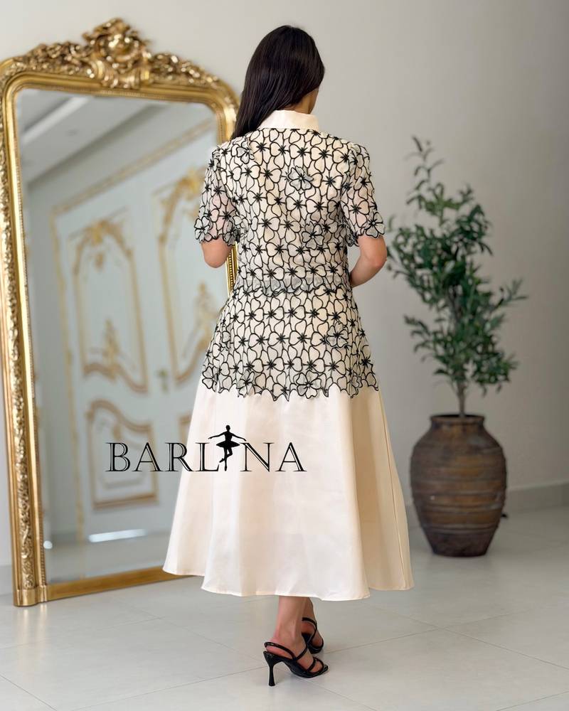 Beige midi dress with black floral embroidery