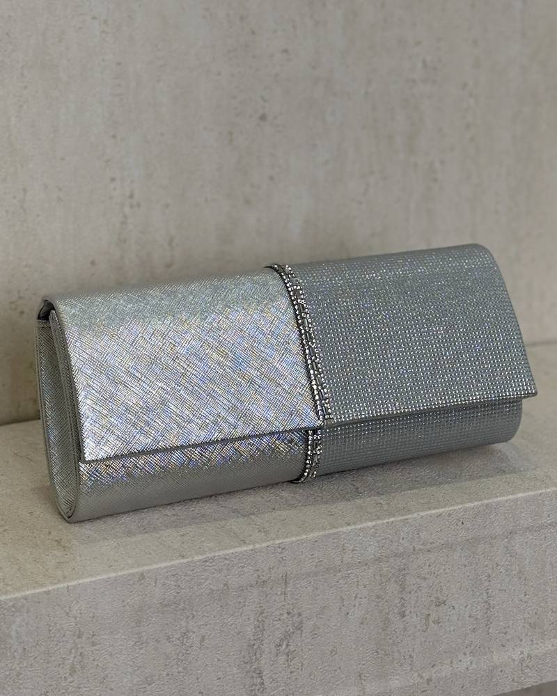 Evening bag decorated with a studded ribbon in the middle