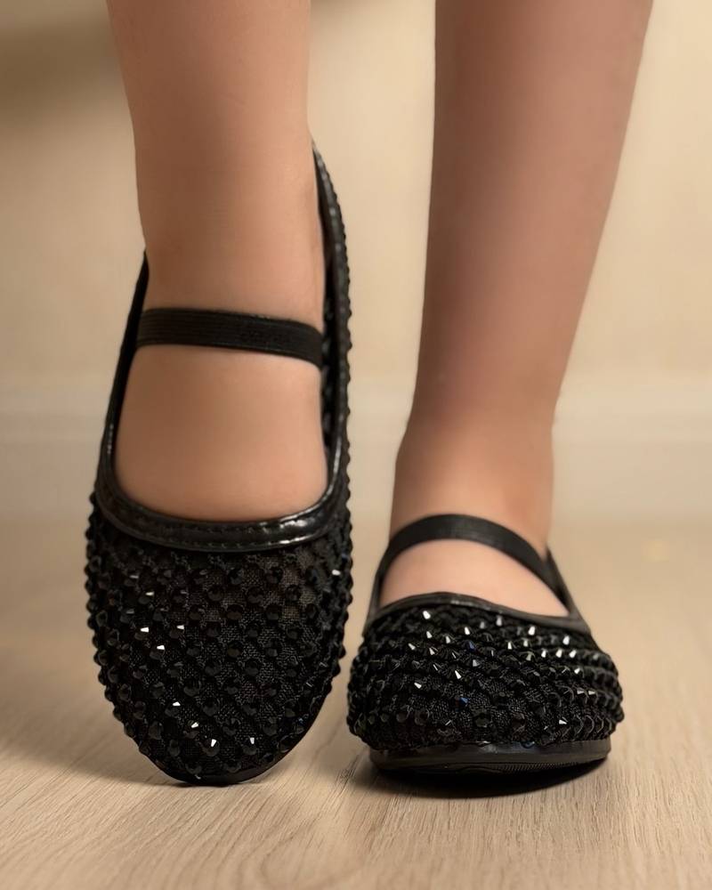 Soft girls' shoes adorned with sparkling crystals