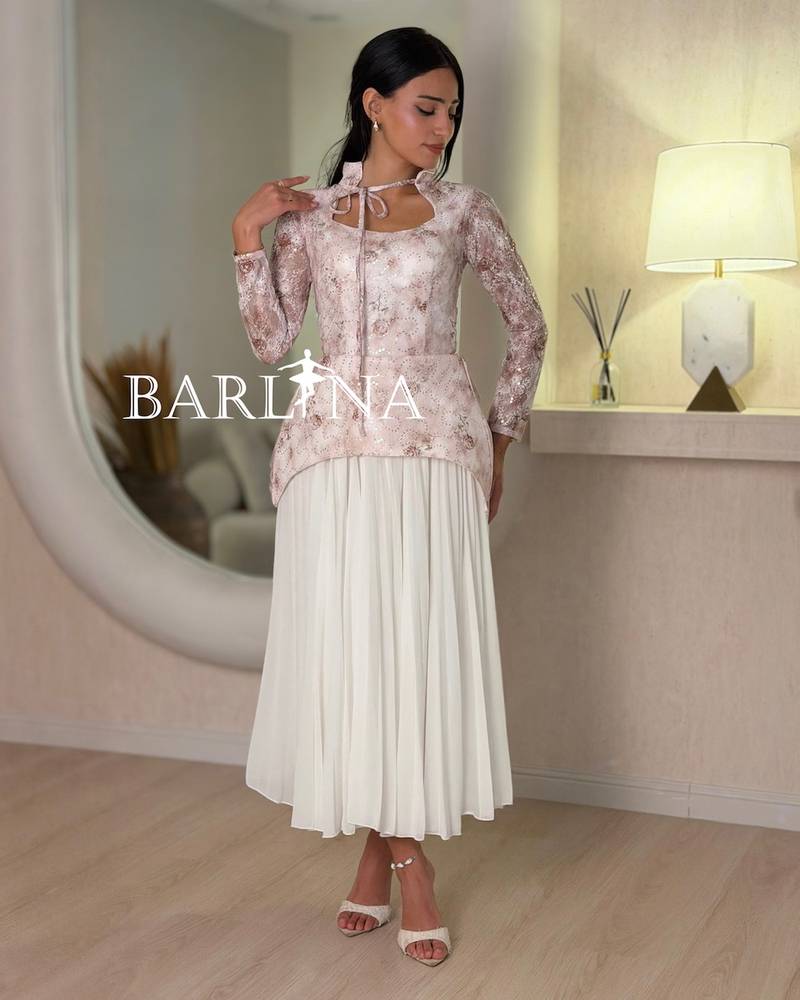 Pink lace dress with a soft bow tie