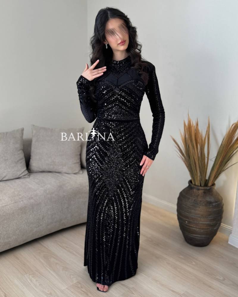 Black velvet dress with shimmering embroidery