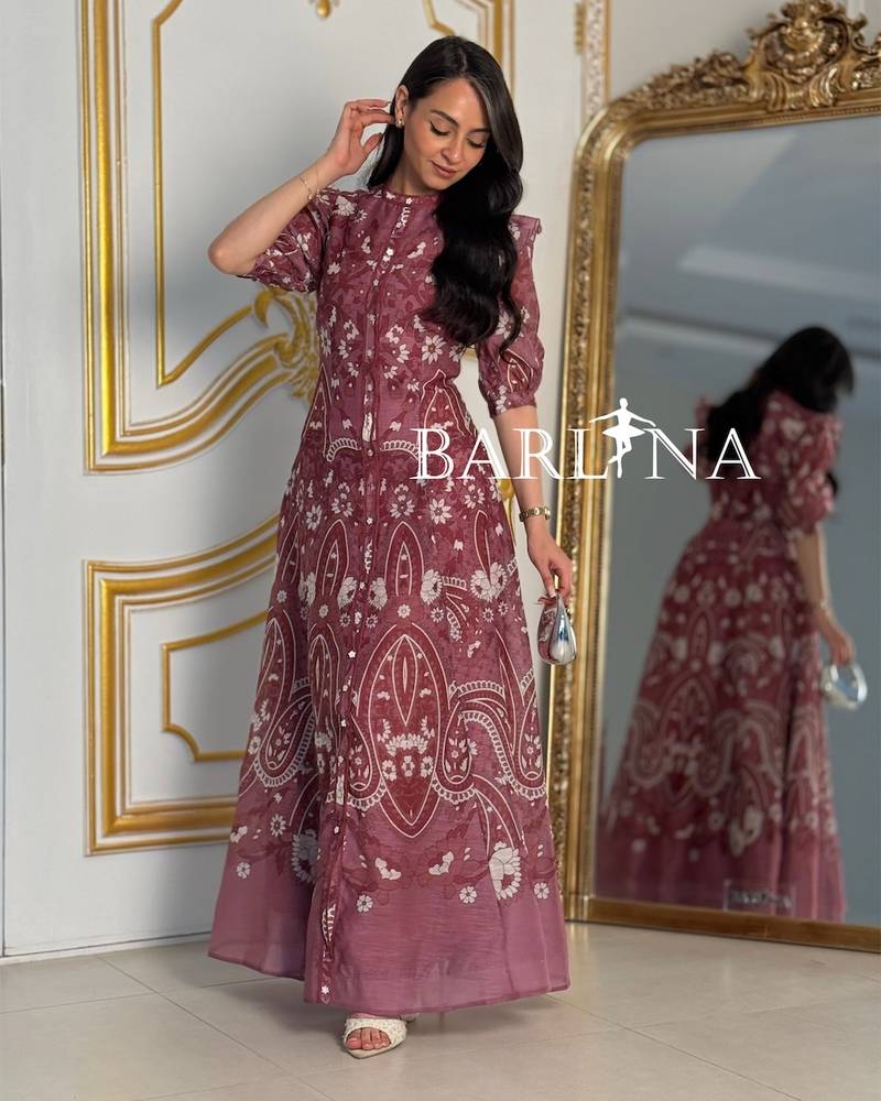 Long pink dress with soft ruffled sleeves