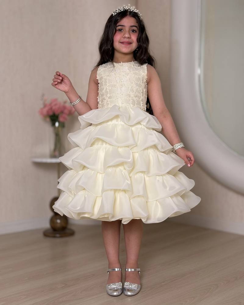 Ivory girls' dress with multiple ruffle layers