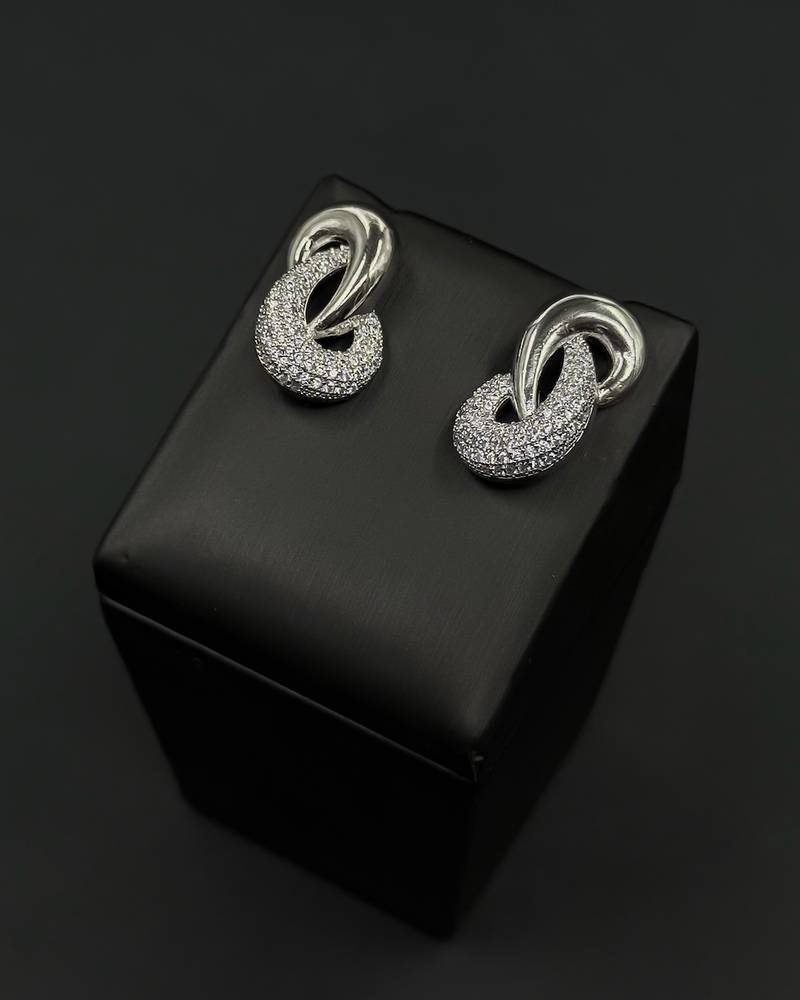 Luxurious earrings with interlocking studded hoops