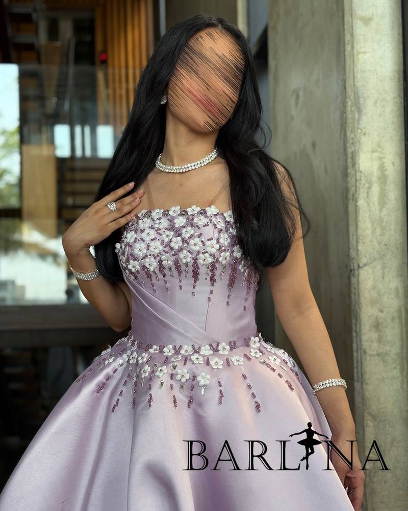 Purple evening dress with small white flowers