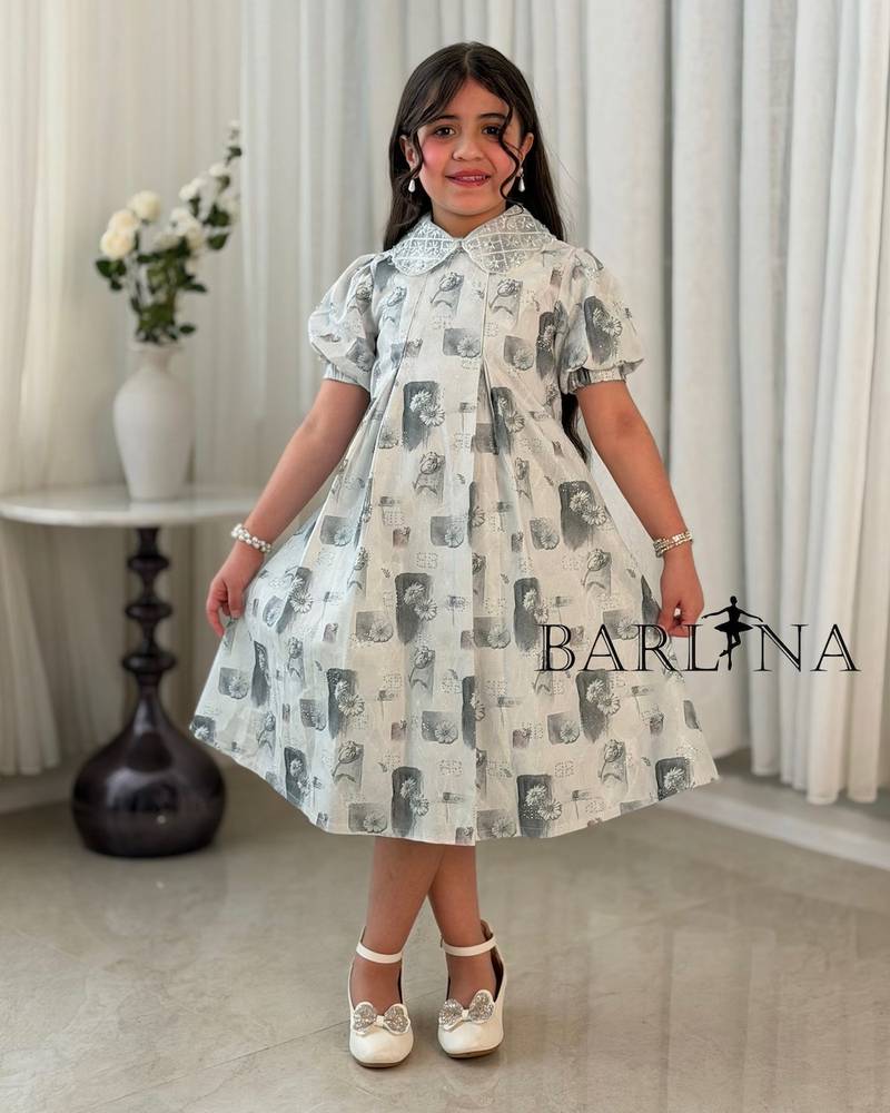 Girls' dress decorated with printed patterns