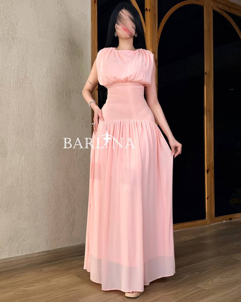 A soft pink dress with a simple and elegant design
