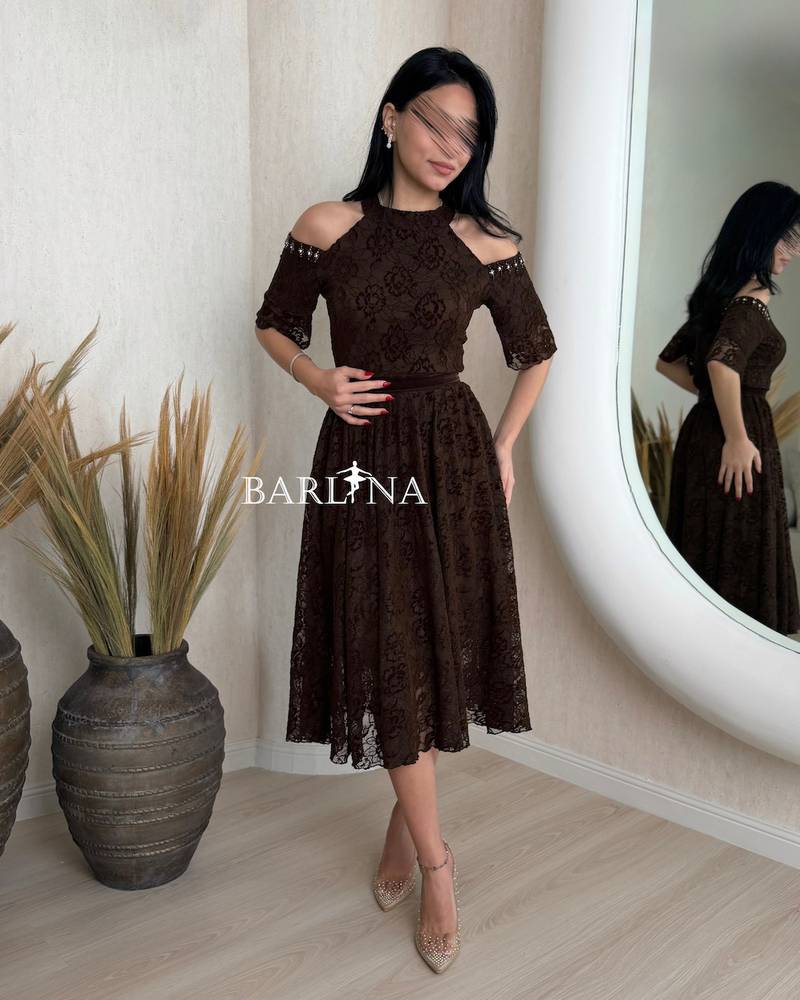 Brown dress with off-the-shoulder design and elegant lace
