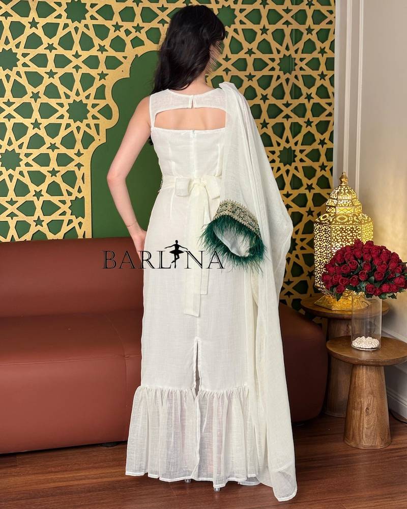 Elegant off-white jalabiya with light green embroidery