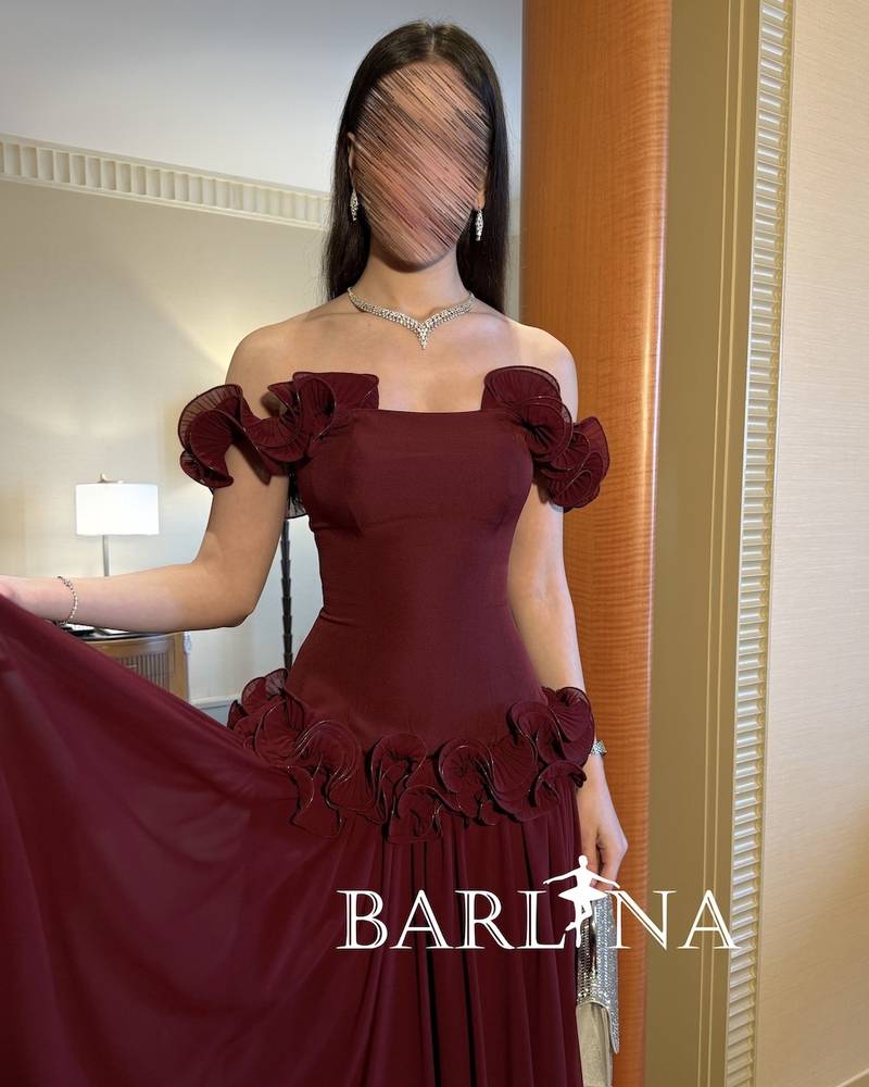 Off-shoulder burgundy dress with delicate floral details