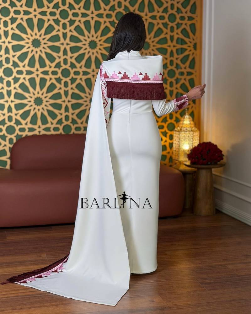 Modern white jalabiya with traditional embroidery