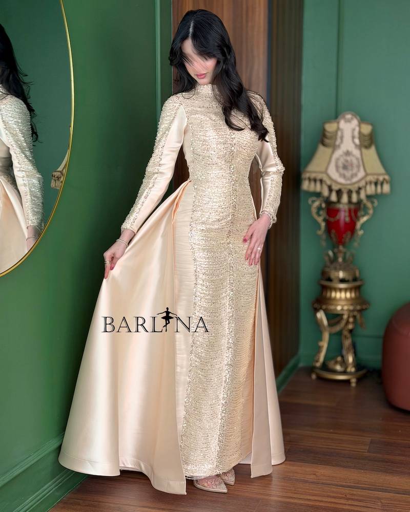 Cream gold-beaded dress with a back train